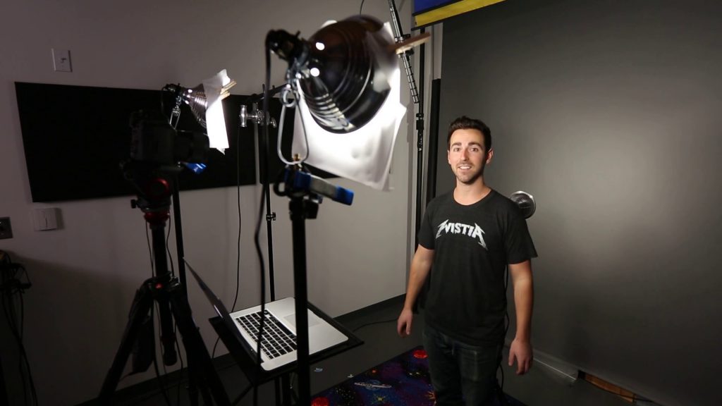 A man recording a tutorial video using the light equipment 